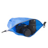 Blue Lightweight Dry Bag with camera gear laying inside open bag