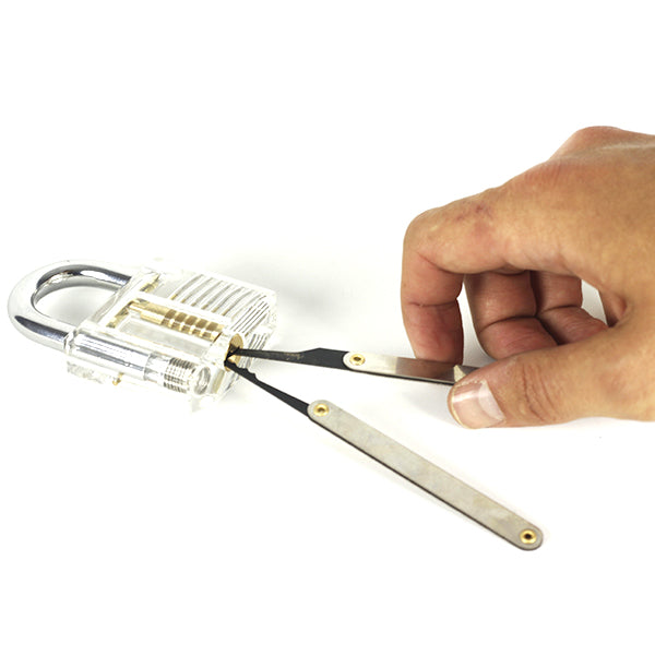 Hand holding 1 lock pick set tool