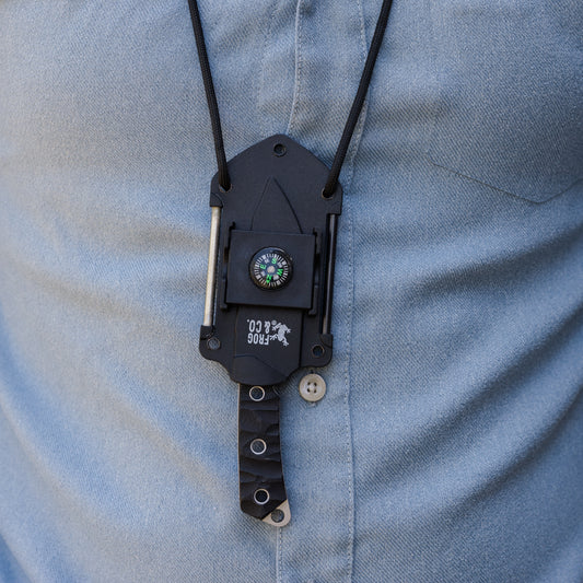 neck knife hanging around man's neck with paracord lanyard