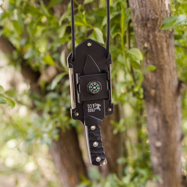 Neck Knife hanging from tree with paracord lanyard